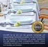 A table setting with white plates, cutlery, and a decorative flower. Produktbild-Vorschau