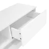 A close-up view of an open drawer on a white TV cabinet. Produktbild-Vorschau
