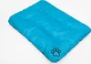 A blue dog mat with a paw print logo on a white background. Produktbild-Vorschau