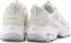 A pair of beige and white Skechers D Lites sneakers shown from the back. Produktbild-Vorschau