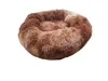 A fluffy, round pet bed in a brown gradient. Produktbild-Vorschau