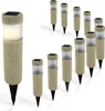 A collection of solar-powered garden lights with a stone-like texture. Anteprima dell’immagine prodotto