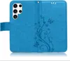 A blue flip case for a smartphone, open to show the inside and the camera cutout on the back. Produktbild-Vorschau