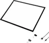 A flat, illuminated drawing board with a black frame, shown from a slightly elevated angle on a white background. Two binder clips and two USB cables are placed in the lower right corner. Produktbild-Vorschau