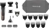 A collection of grooming tools and accessories, including a hair clipper, various attachments, a charging cable, and a storage pouch, laid out on a white background. Produktbild-Vorschau