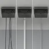 A three-panel image showing a ceiling-mounted cable management system with different levels of cable concealment. Podgląd zdjęcia produktu