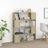 A bookshelf filled with books and decorative items in a room. Voir les images du produit