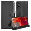 A black flip cover wallet case for a Motorola Moto G85 phone is shown, with the phone inside and its screen displaying the time and date. Produktbild-Vorschau