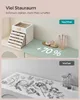 A split image showing a before and after comparison of a jewelry organizer. The top image shows the organizer in use, with makeup brushes and perfumes, and text indicating 'Nachher' (After) and '+70%'. The bottom image shows a cluttered desk with jewelry s Produktbild-Vorschau