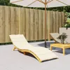 A patio scene with a wooden fence, a lounge chair with a cushion, and a small table with a bottle and glass. Náhľad obrázku produktu