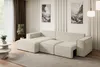 A modern living room with a beige sectional sofa, coffee tables, and artwork on the wall. Produktbild-Vorschau