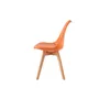 An orange chair with wooden legs on a white background. Anteprima dell’immagine prodotto