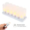 A hand holding a remote control and a set of LED tea lights on a charging base. Náhled obrázku produktu