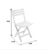 A white folding chair with dimensions indicated by measurement lines and text. Náhled obrázku produktu