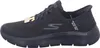 A side view of a black Skechers slip-on shoe. Produktbild-Vorschau