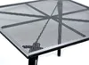 A close-up view of a square metal mesh garden table. Náhled obrázku produktu