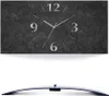 A rectangular wall clock with a granite-like texture and silver hands and numbers, shown against a white background. Produktbild-Vorschau