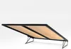 A bed frame with a slatted base, shown from an angle with the base lifted. Produktbild-Vorschau