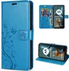 A collage of images showing a blue flip phone case with floral and butterfly embossing, and a phone inside the case. Produktbild-Vorschau