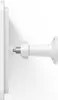 A close-up side view of a white security camera mount attached to a white panel. Náhľad obrázku produktu