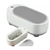 Two ultrasonic cleaners are shown, one larger and one smaller, on a white background. Voir les images du produit