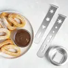 Churros with chocolate dip and cookie cutters on a light gray surface. Produktbild-Vorschau