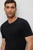 A man wearing a black t-shirt. Produktbild-Vorschau