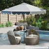 An outdoor patio scene with a large umbrella, two chairs, a table, and a pool. Produktbild-Vorschau