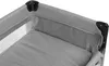 Close-up view of the corner of a grey travel cot. Anteprima dell’immagine prodotto