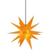 An orange star-shaped lamp hanging from a black cord against a white background. Produktbild-Vorschau
