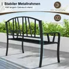 A black metal garden bench is shown outdoors on a patio with greenery in the background. Text overlays highlight product features. Voir les images du produit