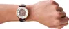 A close-up shot of a person's wrist wearing a watch. Náhled obrázku produktu