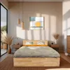A bedroom scene with a wooden bed, nightstands, and decorative elements. Produktbild-Vorschau