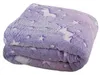 A folded blanket with a unicorn and star pattern. Anteprima dell’immagine prodotto