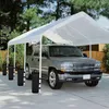 A silver SUV is parked under a white canopy tent, with black sandbags anchoring the tent poles. Produktbild-Vorschau