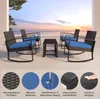 A patio furniture set with chairs and a table on a balcony overlooking the ocean at sunset. Produktbild-Vorschau
