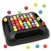 A colorful board game with many small balls arranged on a black board, with some balls scattered around the board. Produktbild-Vorschau