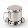 A stainless steel Vietnamese coffee filter with a lid and saucer, presented against a white background. Produktbild-Vorschau