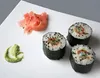 A plate of sushi with ginger and wasabi. Náhled obrázku produktu