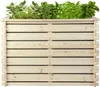 A wooden raised garden bed filled with various herbs. Produktbild-Vorschau