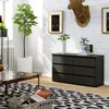 A modern living room with a dresser, plants, and decor. Produktbild-Vorschau