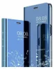 Two blue phone cases are displayed side-by-side, with one slightly in front of the other. The cases have a mirrored surface that reflects the time, date, and temperature, as well as charging status. Produktbild-Vorschau