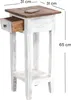 A white and brown wooden side table with a drawer and a shelf, shown with dimensions indicated. Náhled obrázku produktu