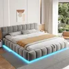 A modern bedroom with a large upholstered bed. Anteprima dell’immagine prodotto