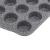 A close-up view of a speckled gray muffin tin. Produktbild-Vorschau