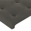 Close-up of a dark gray tufted mattress corner. Produktbild-Vorschau
