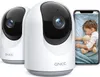 Two GNCC indoor security cameras are shown, with one camera displaying a live feed of a sleeping baby on a smartphone screen. Podgląd zdjęcia produktu