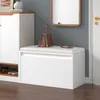An entryway with a shoe cabinet and a bench. Produktbild-Vorschau