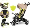A detailed product image of a beige and black baby tricycle, with callouts highlighting safety features. Produktbild-Vorschau