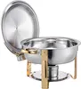 A stainless steel chafing dish with a gold-colored stand and handles, shown with its lid open. Produktbild-Vorschau